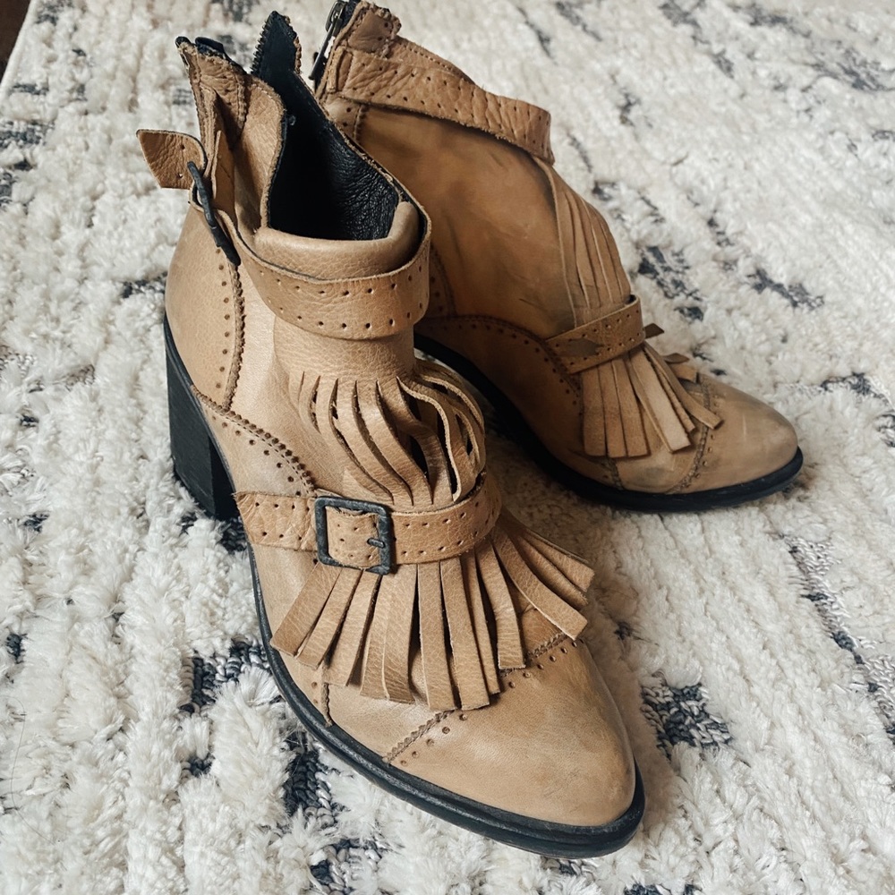 Free people western fringe heels with buckles .